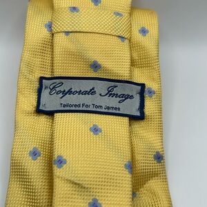 Corporate Image for Tom James Yellow Floral Tie